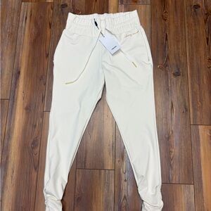 Gymshark Whitney Simmons Unbleached Joggers with Gold Trim